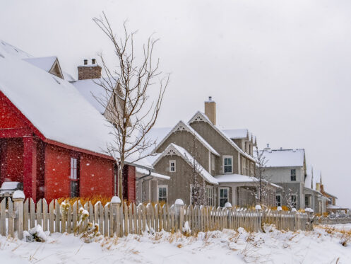 Homes in a neighborhood covered in snow